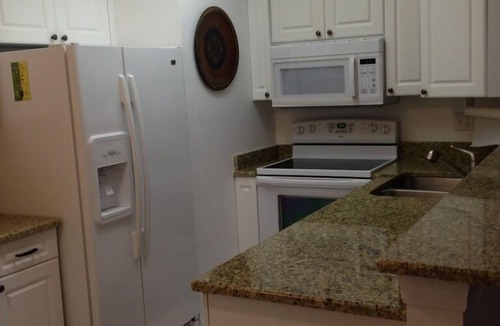 Central Naples Condo | World Tennis Club Condo, Lake View Gated Community