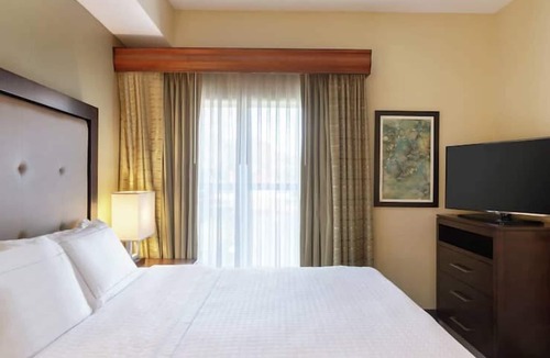 Feather Sound Hotel | Your Home Away From Home! Free Breakfast, Outdoor Pool, Full Kitchen!