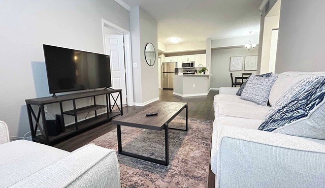 2 BR with Private Garage, Boutique Shops & Pond Views