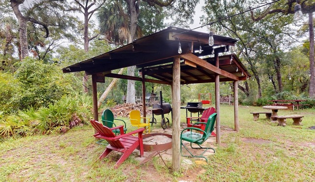 2 riverfront cabins with large yard, grill, firepit, canoe, & private W/D in Morriston