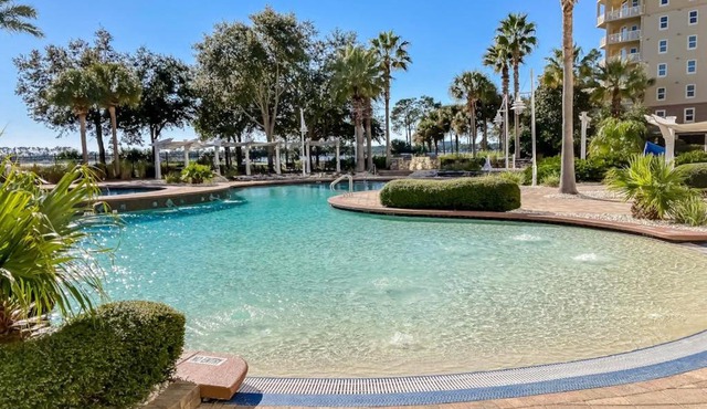 3rd-floor beach & pool-view condo with outdoor pool hot tub grills balcony