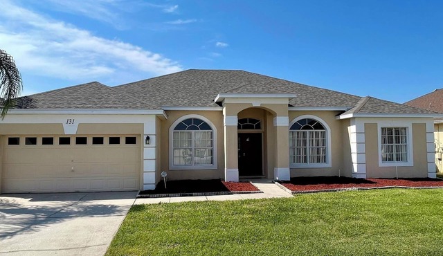 Ample space and modern elegance await at this 5/3 Pool Home located at Highlands Reserve Golf and Country Club