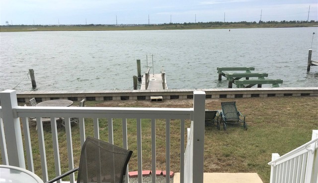 Bay-Front single family home that features expansive Intracoastal waterway views with easy Townsend inlet access