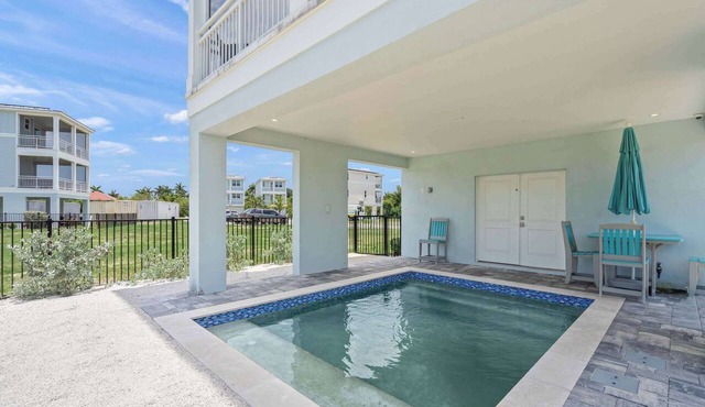 Baydream Believer at Hunters Point. A Luxury Waterfront Resort Home by Mainsail Vacation Rentals