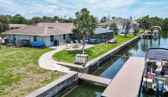 Canal-front 4BR/2BA home with pool and brand-new dock—room for 2 boats! Recently remodeled, 2-car garage, and minutes to the Gulf. Perfect Crystal River getaway! Boat and trailer parking on property; ramp nearby.
