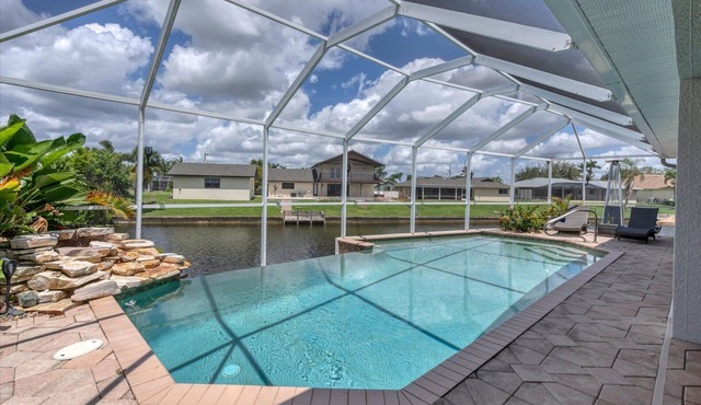 Cape Coral 3-Bedroom Canalfront Pool Vacation Home with Dock