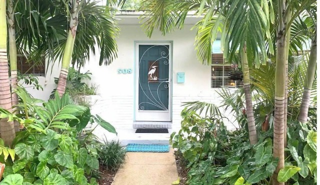 Captains Retreat.An oasis with lush coastal landscaping awaits!