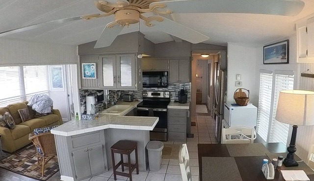 Come enjoy the island lifestyle in this awesome 2 bedroom 1 bath beach house!