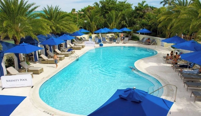 Courtyard Cottage with Porch, Pool, Parking & Shuttle | Steps from Captiva Beach