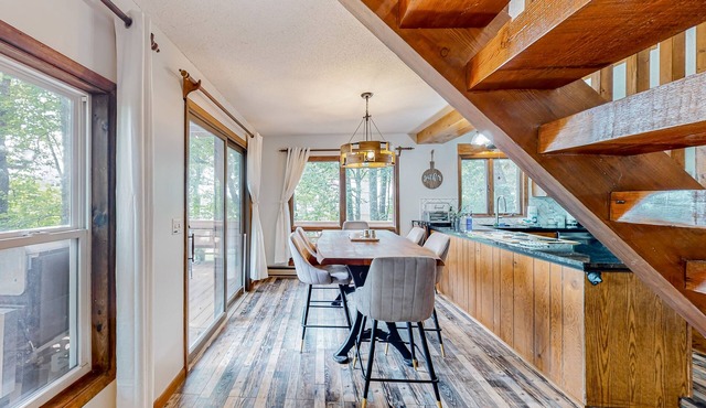 Deck of the Woods | Cottage in Newland lined by trees with pool & tennis access