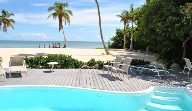 Discover Sea Ranch in Islamorada: spacious 4BR home with private pool and stunning views.
