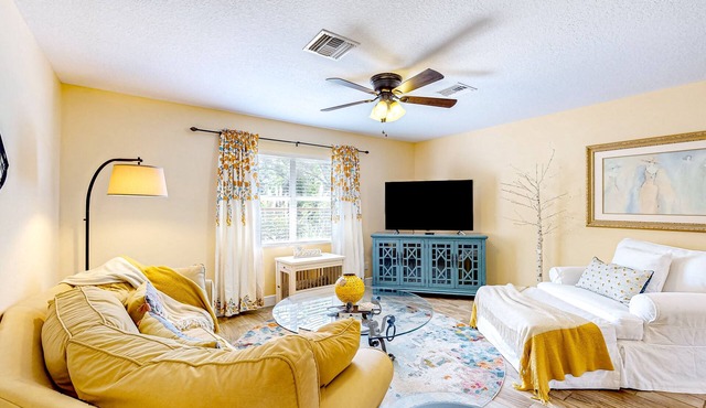 Dog-friendly home on a corner lot with renovated interior & private W/D