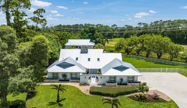 Elegant 4 Bedroom Pool home with pond