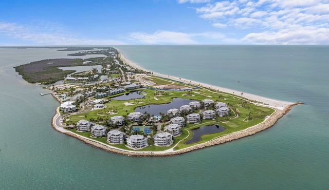 Enjoy golf course & gulf water views at 1666 Lands End Village, a 3-bedroom, 3-bath Captiva condo just a quick walk to Sunset Beach. Guests have access to the association pool, BBQ grills, and pickleball & tennis court. 5-night minimum.