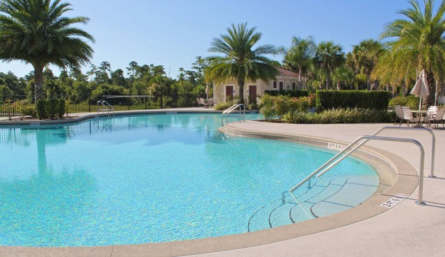 Fantastic Townhome with Club Access, Steps from Walmart, and Close to Disney!