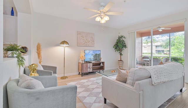 First Floor Condo with lake view - Golf Available! - 5 Mins to Beaches!