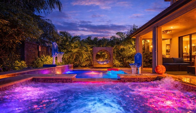 Glow Lakefront Villa: 4K Cinema, Heated Pool & Spa - Sleeps 12, 5BR