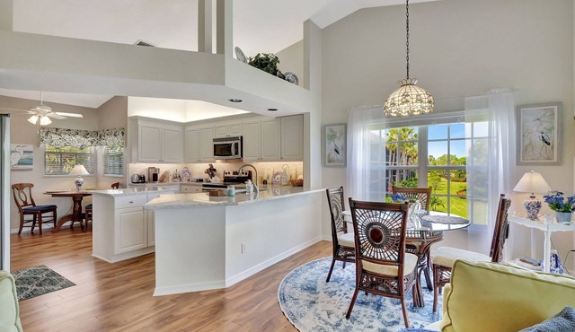 Lake and Golf Course Views From This Corner Unit!