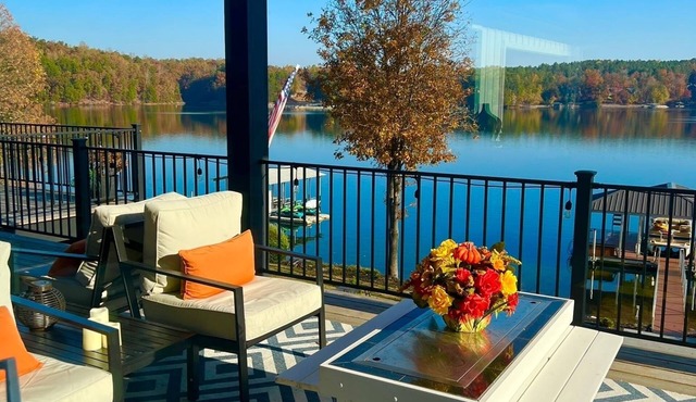 Lakefront, private dock, outdoor kitchen, movie room, ping pong, pool table, etc