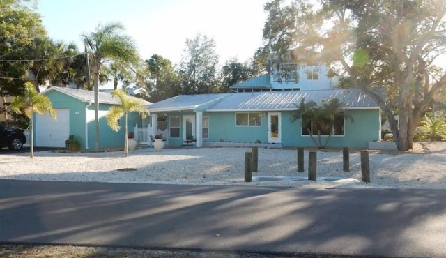 Mid Island Home with Hot Tub 1 Block from the Beach