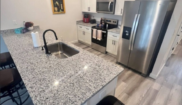 Modern Newton Townhome – 3 BR/2½ BA with Garage and Workspace