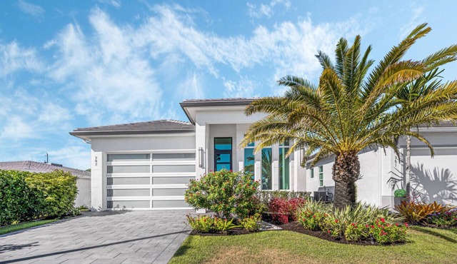 New high end luxury home located in Naples Park! A true taste of upscale living!