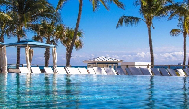 Oceanfront Property | Outdoor Pool } Direct Beach Access | Parking Available