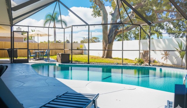 Palm & Petal Oasis | FREE Heated Pool Vacation Home, near USSSA & Port Canaveral
