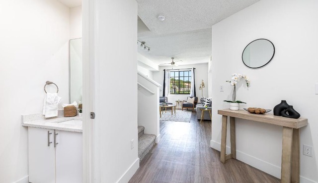 Remodeled Townhome with Pool & Lake Views in Gated