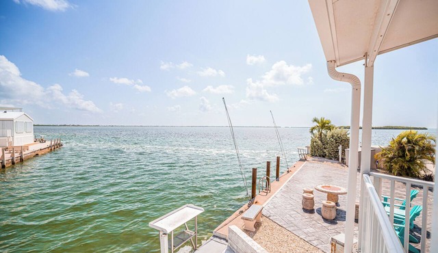 Salty Breeze #161 Canal-Front Retreat with Dock, Pool & Ocean Views