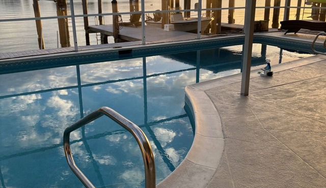 See dolphins and beautiful sunsets at this newly remodeled Isles of Capri Home.