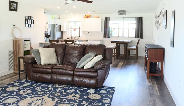 Spacious Retreat: Porch, Fenced Yard, Near Lake