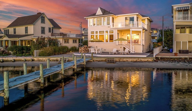 Stunning bayfront w/private bay beach and dock