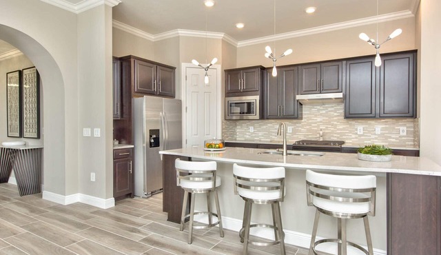 Stylish 3bd home with den and a Heated Pool in Greyhawk at the Everglades.