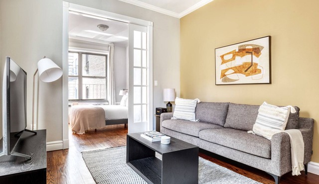 Sunny West Village 2BR w/W/D, near 8th Ave Subway, by Blueground