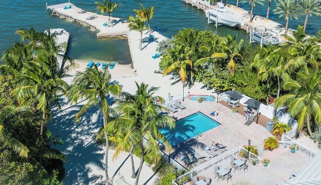 Sunset Waterfront Escape with Swimming Pool Near Coral Reefs | 2 Units