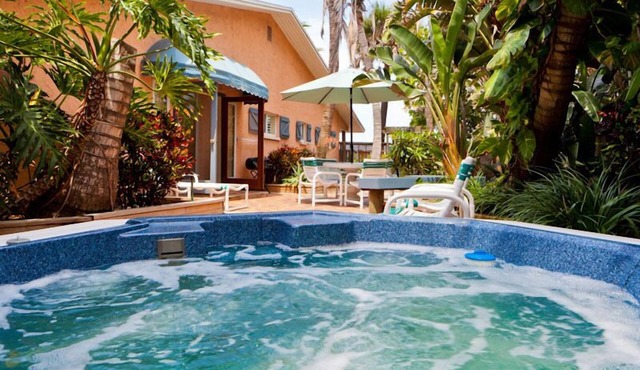 The Palms oceanfront villa. Sleeps up to 6, dog and family friendly.