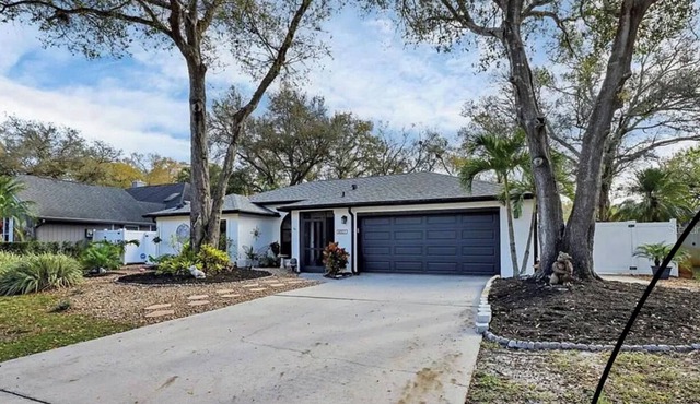 This beautiful 3 bedroom 2 bath pool home is newly updated from top to bottom