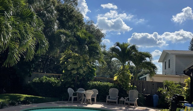 Tropical Beach Town Private Oasis Pool Home & Tiki Lanai Close to Beaches