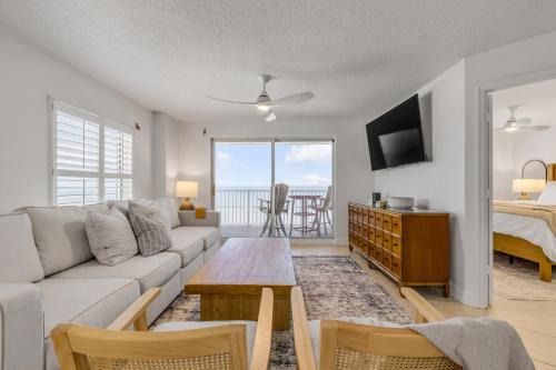 Updated direct oceanfront corner 2/2 with stunning beach views, a heated pool, and parking garage in Ormond Beach