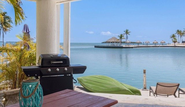 Waterfront 2BR in Venture Out with 35' Dock, Pool & Marina Basin Views