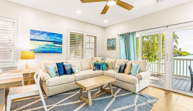 Waterfront, dog-friendly home with beautiful canal view & 2 shaded porches