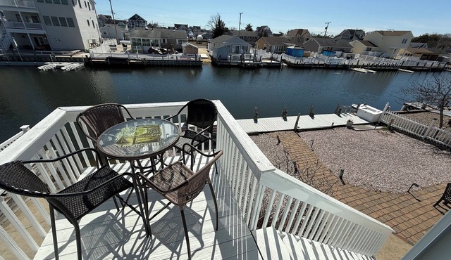 Waterfront Lagoon Retreat with Private Dock & Boat Ramp