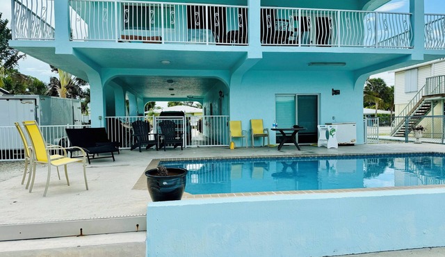 Yellowtail Island Retreat - 3BR Keys Home w/Pool, Dockage, Porch & Canal Access