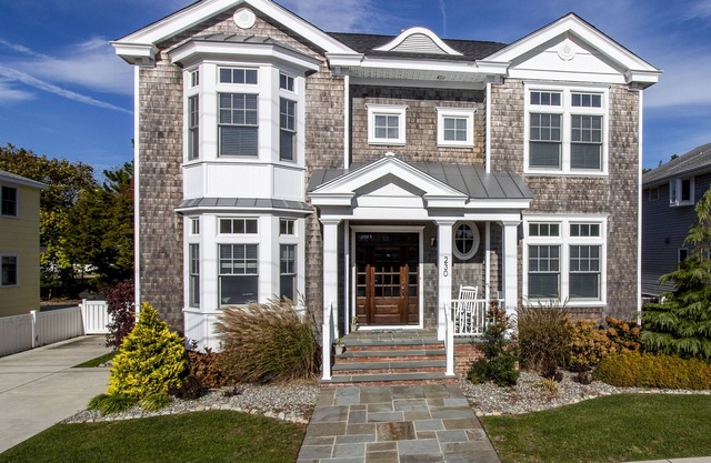 Located just 1 ½ blocks to the beach, this distinctive property boasts seven (7) bedrooms, each with their own custom, private bath, as well as one powder room and an exquisite, solid mahogany, outdoor shower