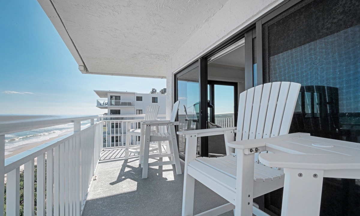 New Smyrna Beach Condo | Luxury, direct oceanfront 2/2, top-floor corner with wrap-around balcony and heated pool