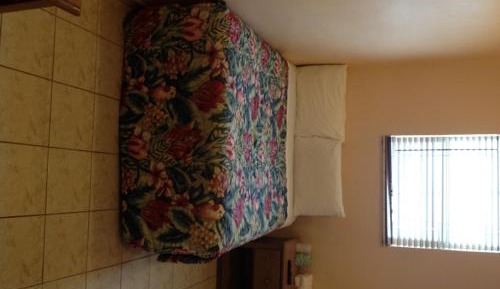 Queen Room with Shared Bathroom