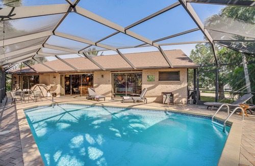 Eight Lakes Cottage | Heated Pool, 3 Mi to Dtwn: Cape Coral Escape!