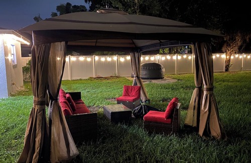 Ybor City House | Relaxing AF Tampa Home with Hot Tub, Outside Fun, and TVs in every room!