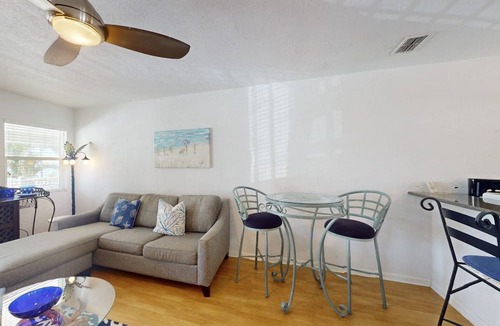 Pass-a-Grille Historic District Condo | Heart of Pass-A-Grille Beach! Beach Across the Street ~ Community Heated Pool ~ Beach-facing Balcony